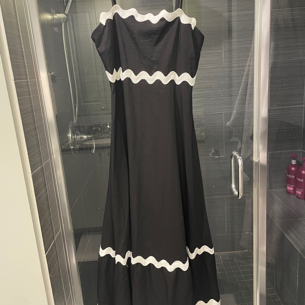 Black spaghetti strapped dress with white ric rac